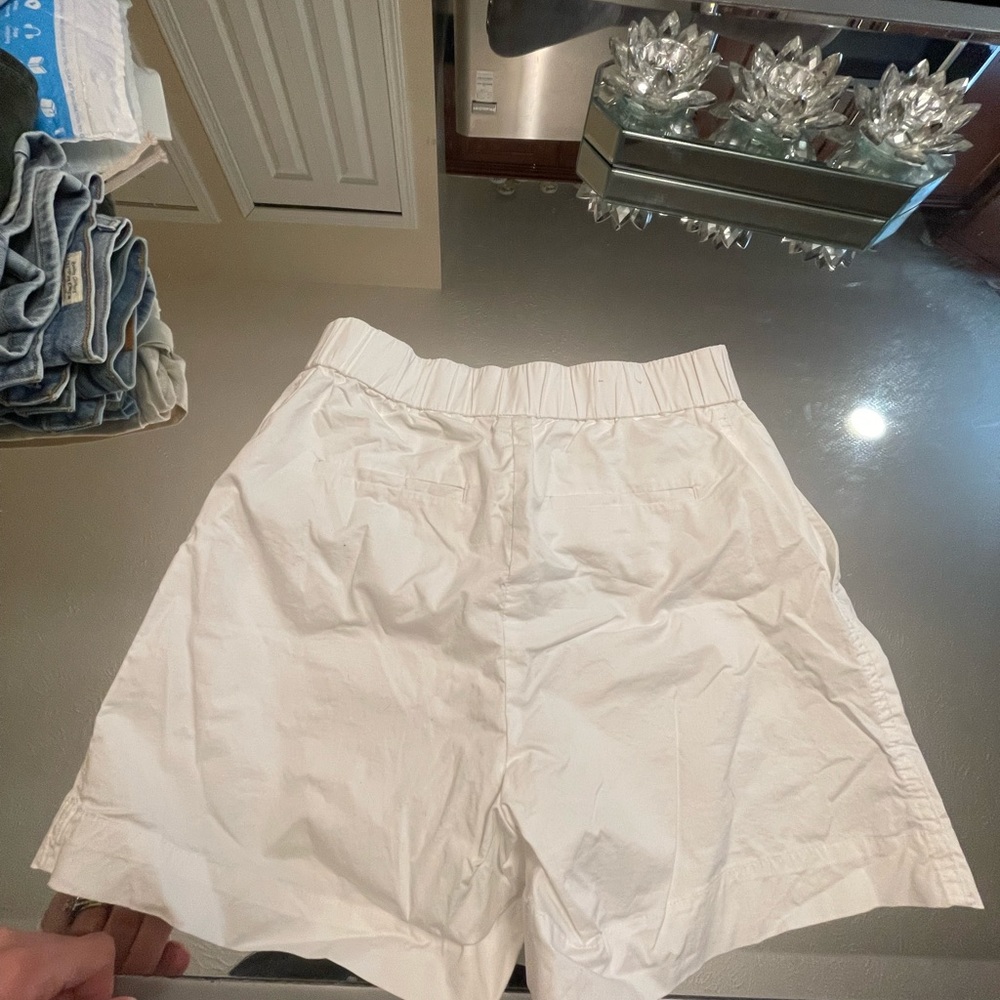 Calvin Klein white shorts.
